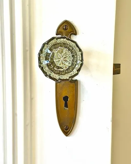 Unit #504 this flat has gorgeous 1920's detailing including door hardware and crown moldings!