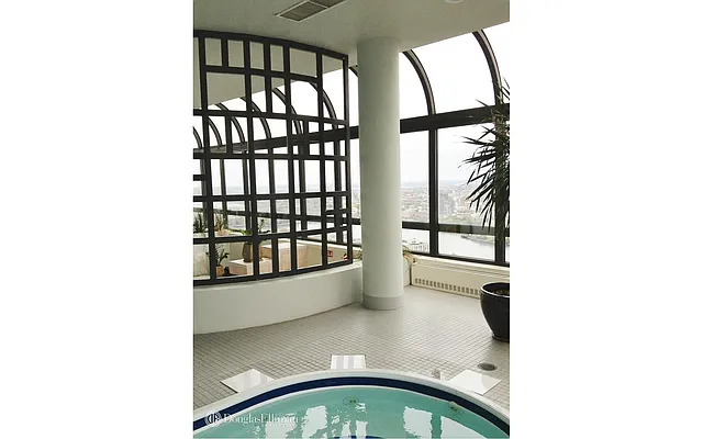 Sold by Douglas Elliman | media 18