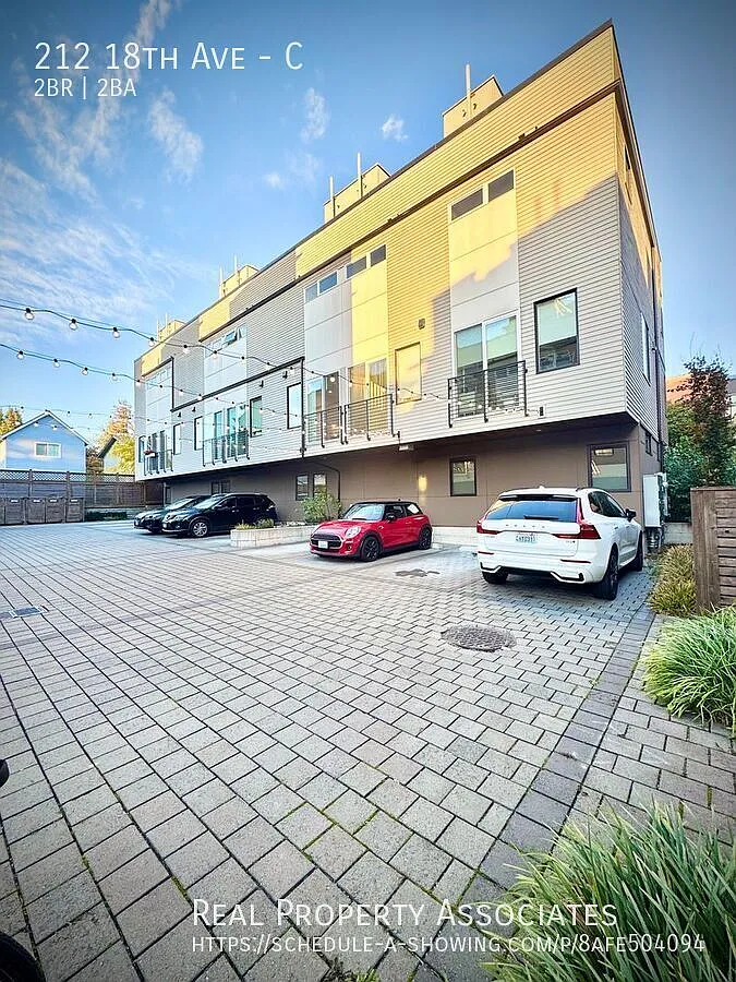 Modern Elegance Meets Urban Comfort Stunning 2 Bed / 2 Bath Townhouse with Rooftop Deck & Gated P... — Photo 1
