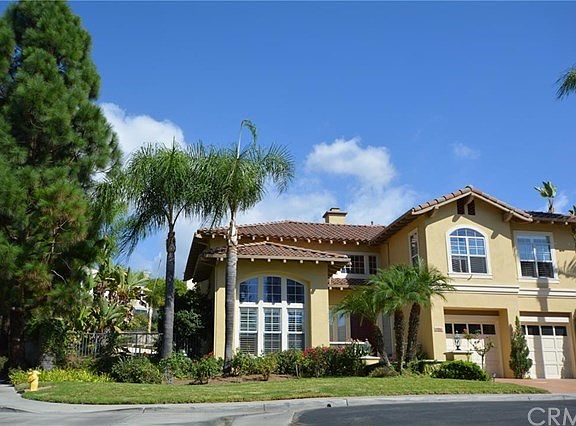 Corner property with views to Mission Lake from yard
