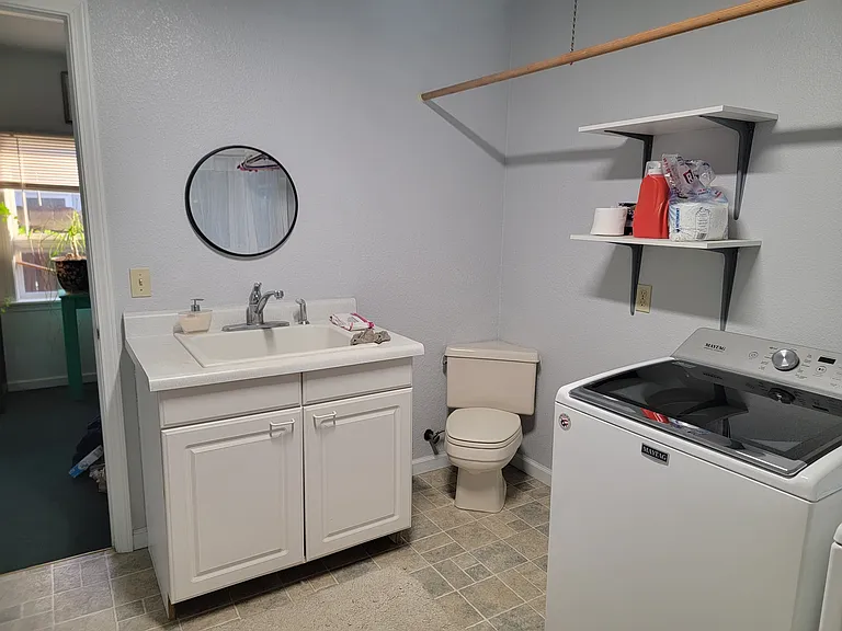 Dedicated bathroom in laundry room