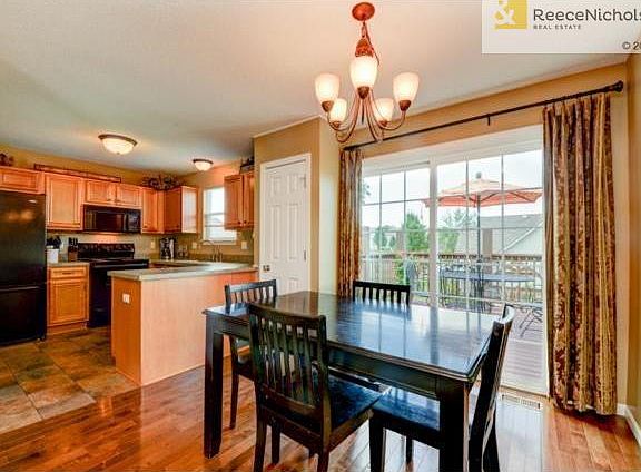 Upstairs in the dining area there are gorgeous hardwood floors (