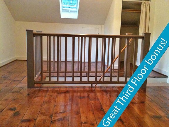 Bedroom 2 (third floor) has vintage refinished hard wood flo