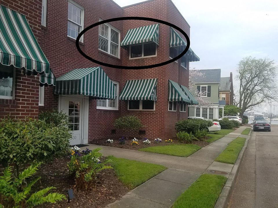 Exterior view of the building. Unit 4 circled.