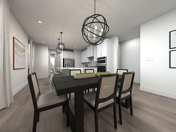 The open-concept floorplan allows for an easy flow between the kitchen and dining areas.