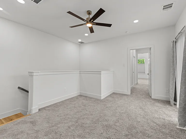This open area separates the master bedroom from the other bedrooms that can be a designated workplace, fitness, or entertainment area.