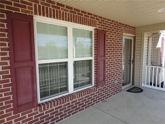 Covered Front Porch Enjoy your morning coffee or evening rest