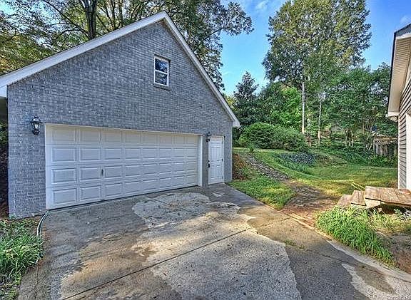 2 car garage with storage room
