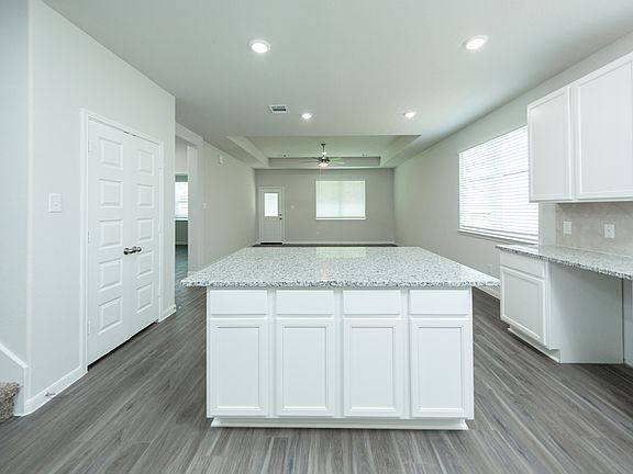 Kitchen to Dining Area and Family Room
