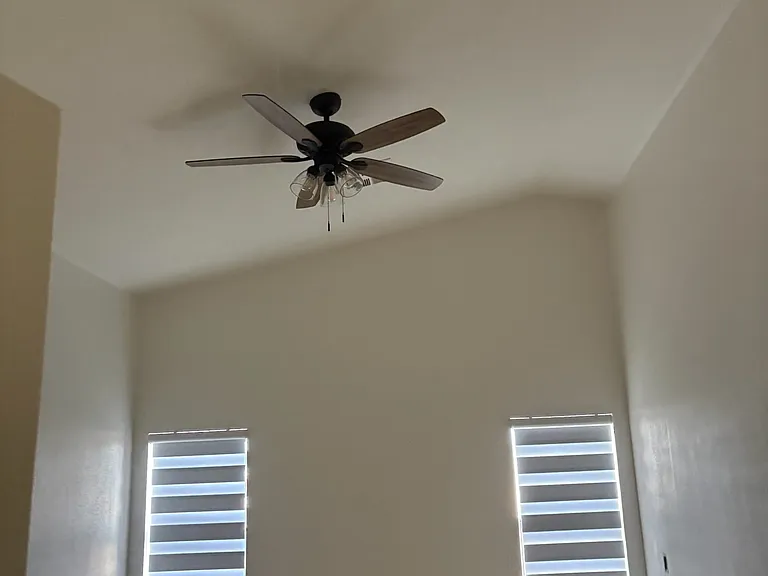 Primary bedroom w/view to pool
Five new matching ceiling fans with light kits
