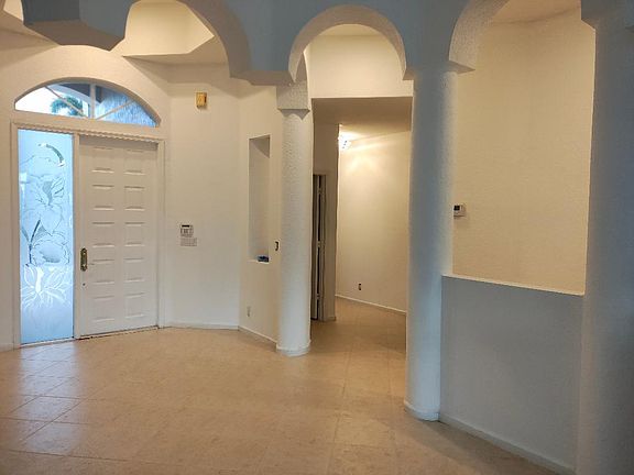 Entry, half bath and bedrooms access