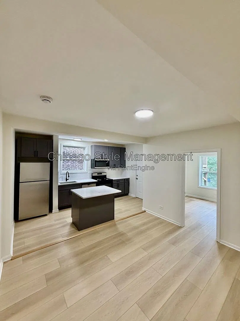 7833 S Colfax Ave — Photo 4