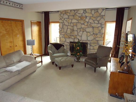 15' x 20'   Wood burning fireplace with stone surround