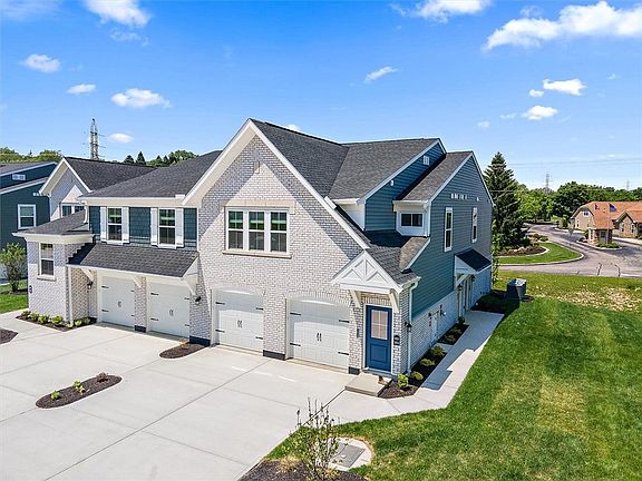 This modern townhome boasts a well-maintained exte
