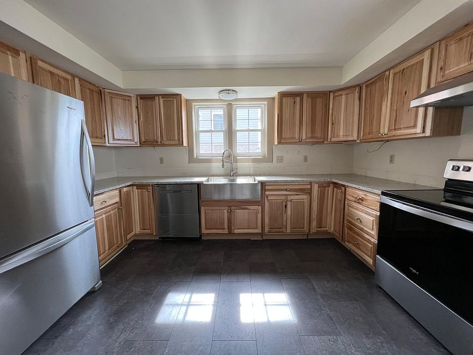Stunning, completely brand new kitchen! Hickory cabinets, granite counters, stainless appliances, farmhouse sink, and more. Renovations are still underway including recessed lighting in ceiling, tile backsplash, and under cabinet LED lighting.