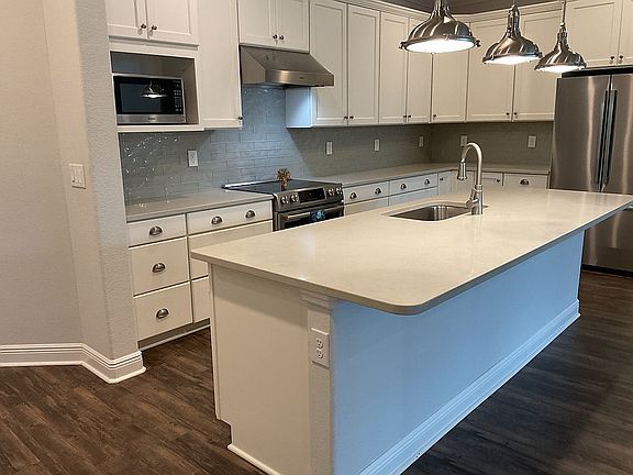 Quartz countertops tile back