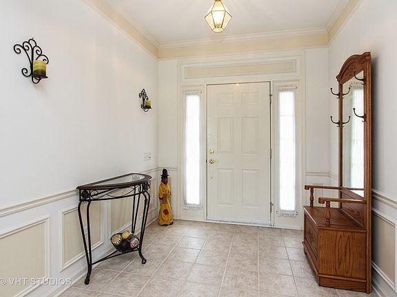 Gracious and bright Foyer welcomes you into this lovely home!