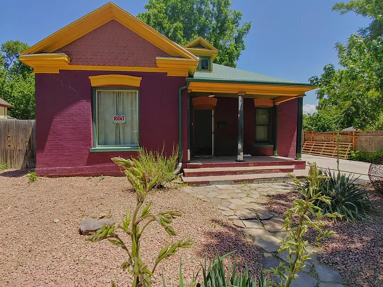 Brightly colored brick bungalo