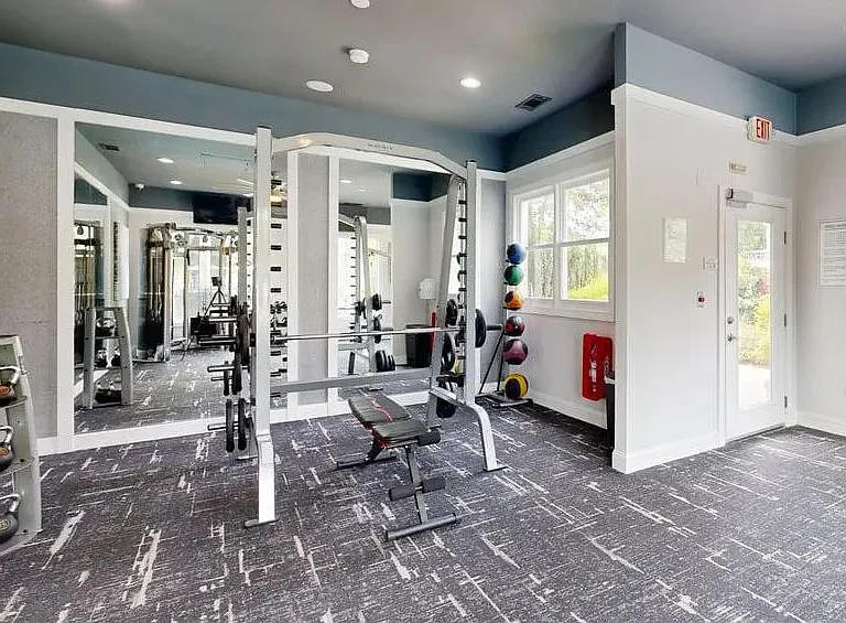Whether it's leg day or arm day, this thoughtfully designed gym space has what you need to challenge yourself and stay consistent.
