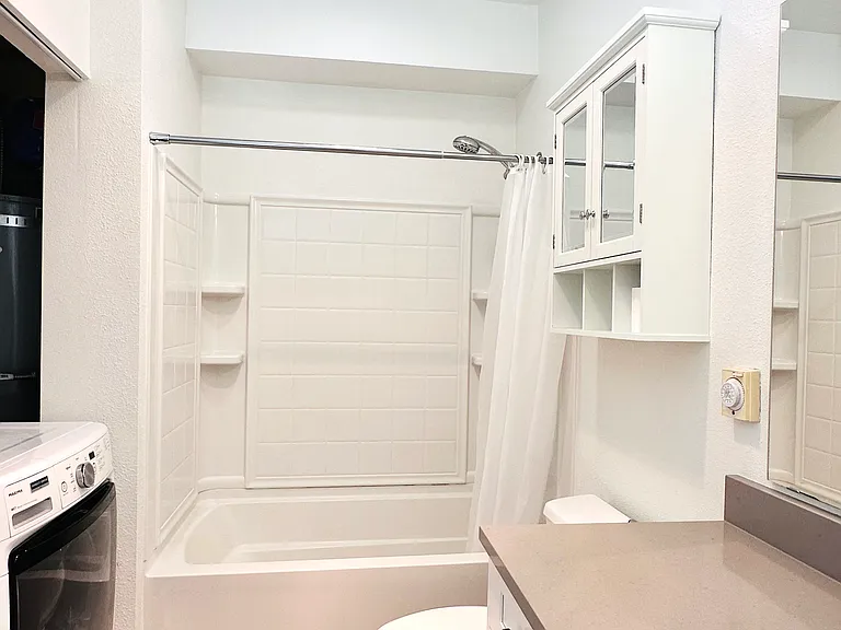 Bathroom with new quartz countertop.