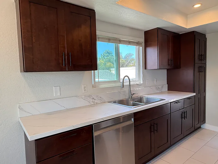Kitchen with full pantry on the right and view toward ocean