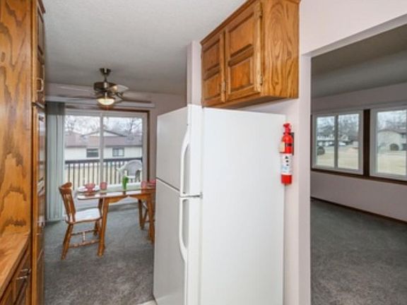 The living room has and entire main level has brand new carpet and freshly painted.  Sunny exposure!