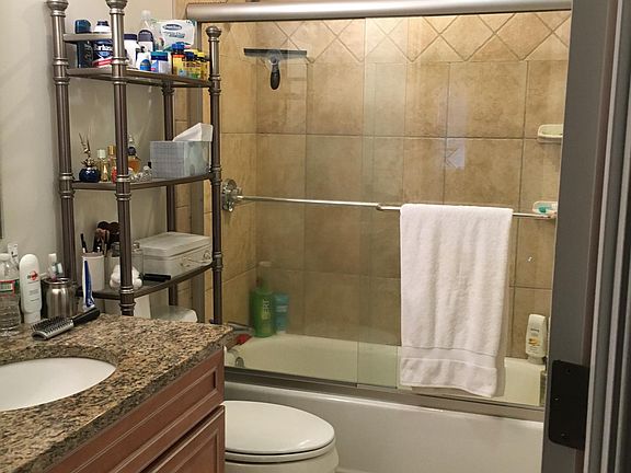 Full bath with tub and shower on second floor.