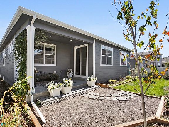 Back patio and yard. Faces west