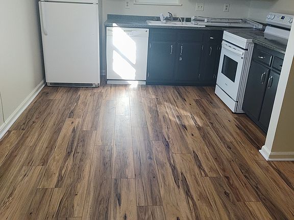 Dining area and kitchen with brand new luxury vinyl plank