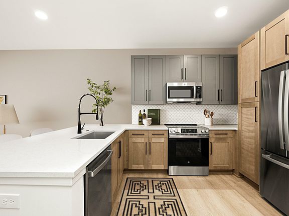 Elevated kitchens wtih stainless steel appliances