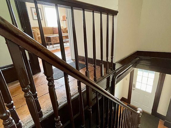 Private entry from porch with 1st fl foyer, upper hallway landing for additional space