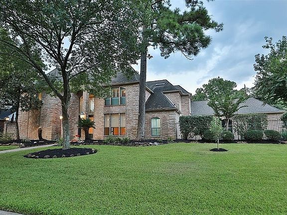 LARGE LOT OVER 12,000 SQ FT - This corner lt is actually 1.5 lots with over 12,544 SQ FT. The private courtyard can barely be seen.