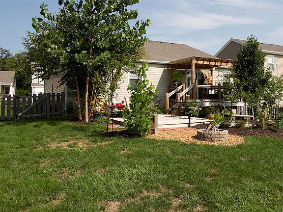 Your level backyard comes fenced with firepit, pizza oven, and pond!!!  Just bring your lounge chairs!