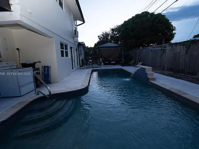 5941 NW 14th Ct — Photo 39