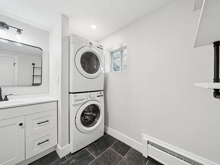 Laundry in Main Bedroom Bathroom