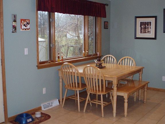 There is a large eat in area in the kitchen for family.
