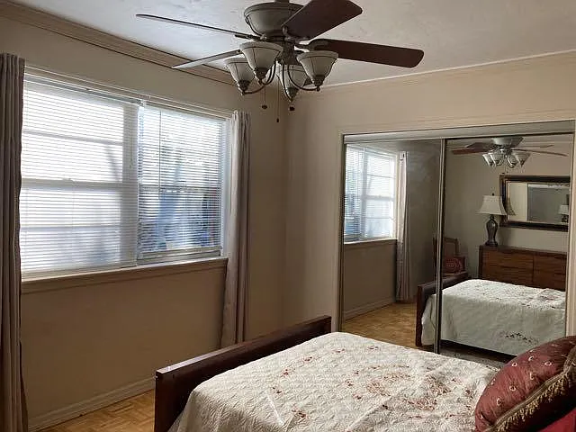 bedroom 1 with mirrored closet