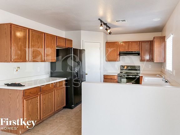 4th image of 12830 W Pershing St
