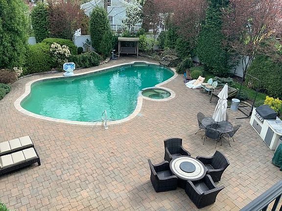 view of pool and patio from loft.jpeg