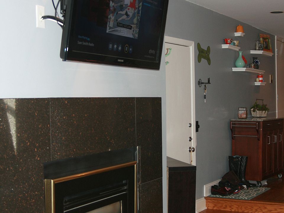 Fireplace and mounted TV, perfect living space!