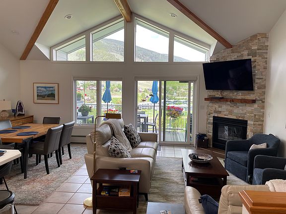 Open kitchen-living-dining room, and back deck.