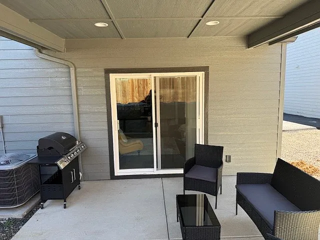 covered 12x12 patio with lights on every unit
