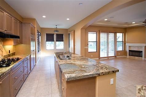 Great Kitchen with breakfast room that looks to the back yard pool, spa and views! Gorgeous granite.