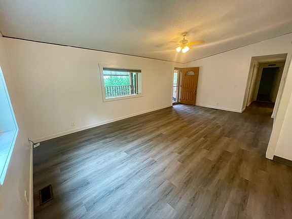 Front Room attached to hallway and dinning room.