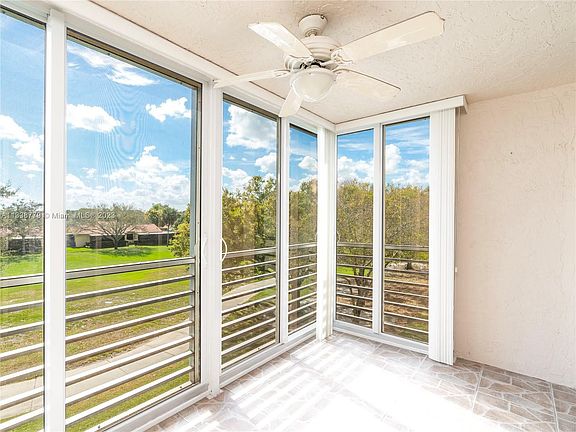 2nd image of 9520 Seagrape Dr APT 304