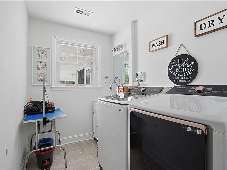 Laundry room. Washer and Dryer are included. Sink is available in the laundry room.