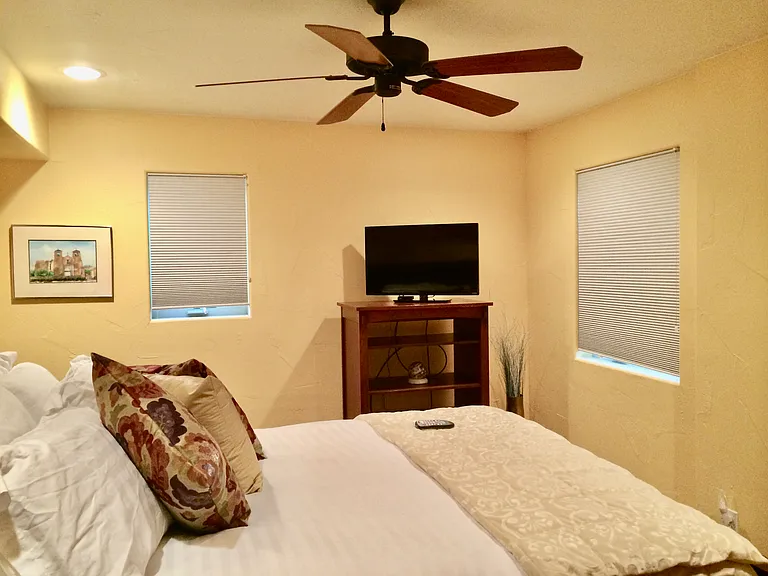 Main level secondary bedroom with 3/4 bath just steps away.