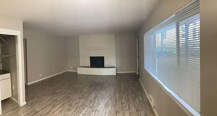 great (dining area & living rm space) room with fireplace