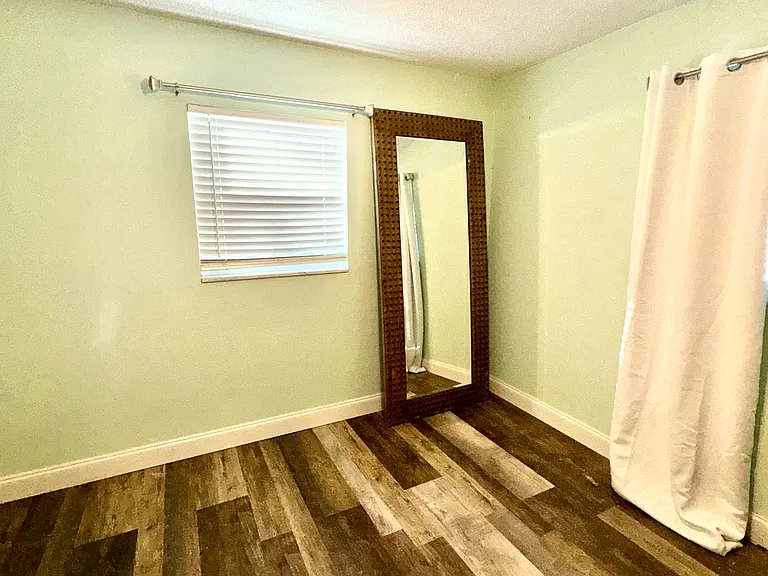 master bedroom with queen size bed
