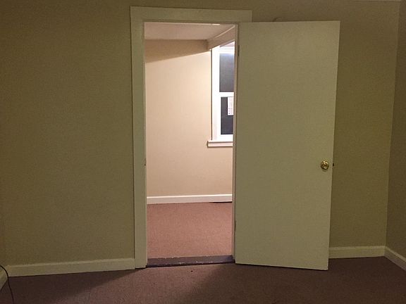 Living room looking into the bedroom